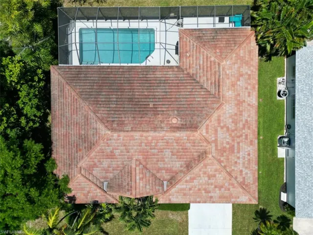 View from above of property featuring a pool