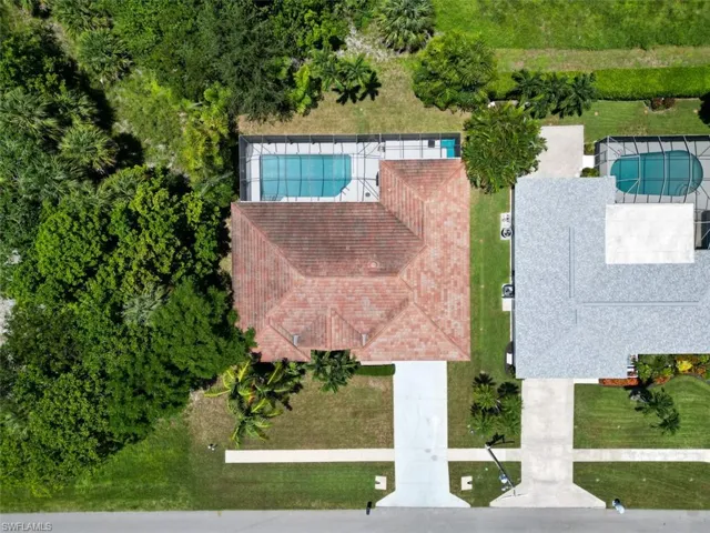View from above of property featuring a pool area