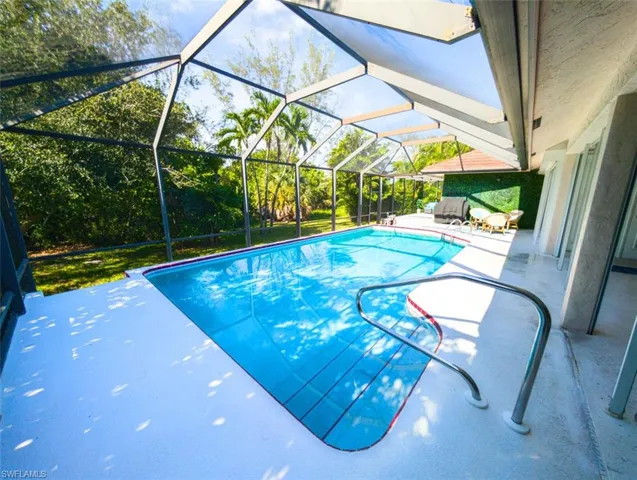 Swimming pool with a patio area