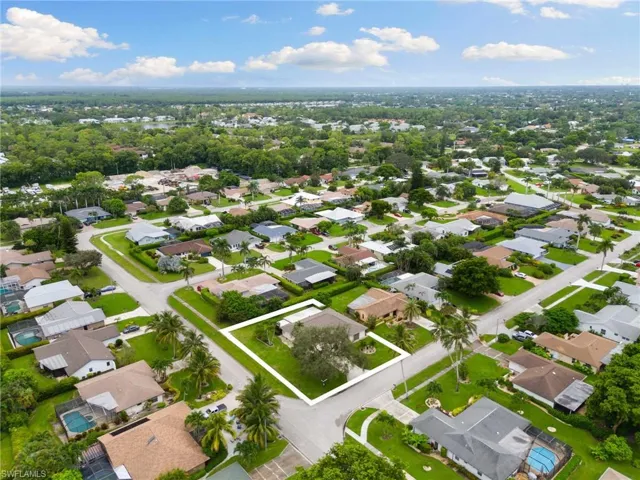 Aerial overview of property's location with nearby suburban area