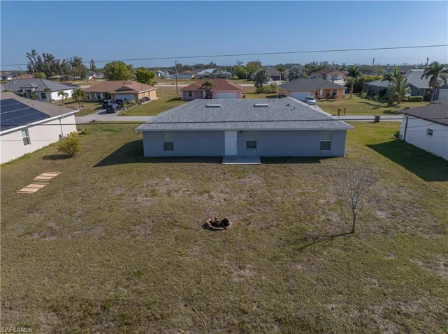 Drone / aerial view of rear of home