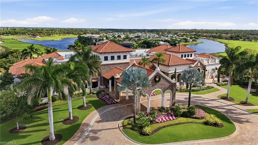 Bird's eye view of a nearby body of water and a golf club