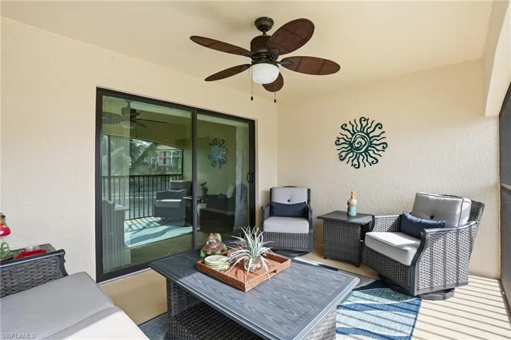 View of patio / terrace with a ceiling fan and outdoor lounge area