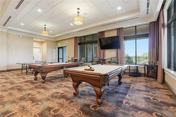 Rec room with crown molding, pool table, and recessed lighting