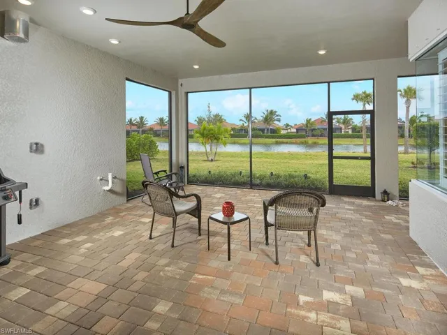 This is the life! Enjoy warm days and cool nights on the spacious covered lanai. The plumbing and ductwork are in place for a new outdoor kitchen, a valuable upgrade!