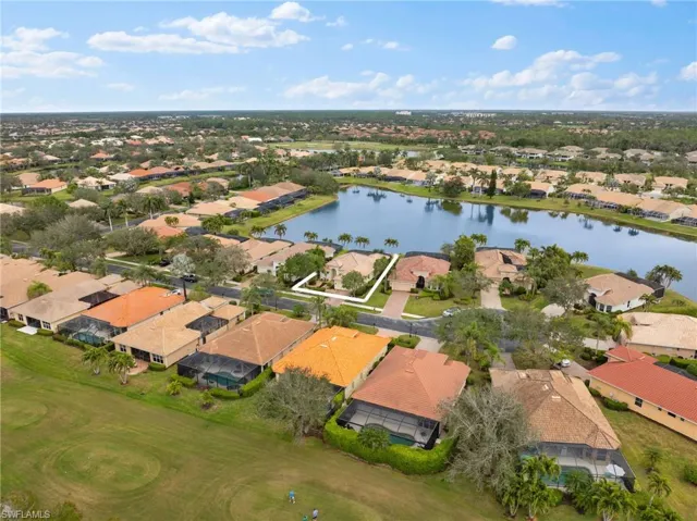 Bird's eye view with a residential view and a water view