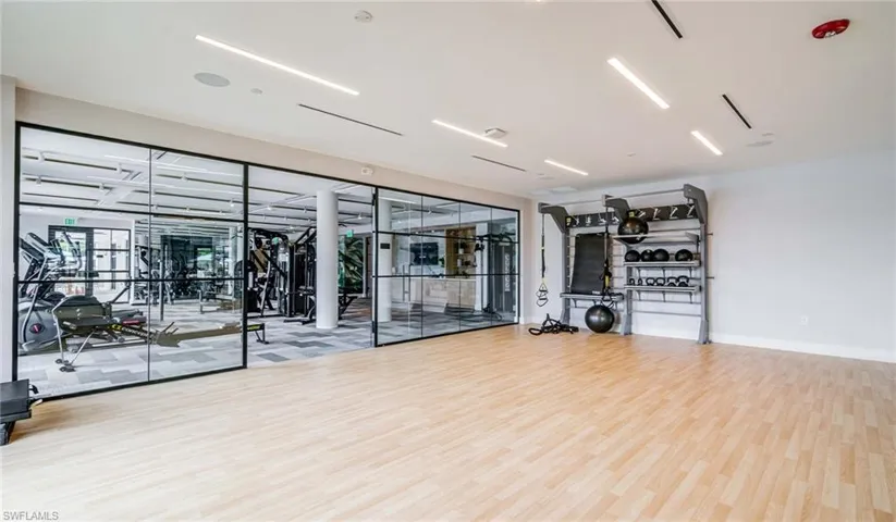 Exercise room with wood finished floors