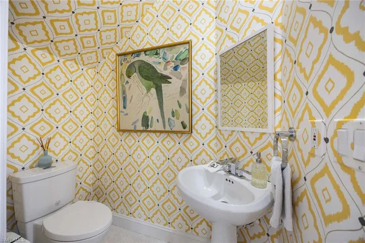 Conveniently located powder room.