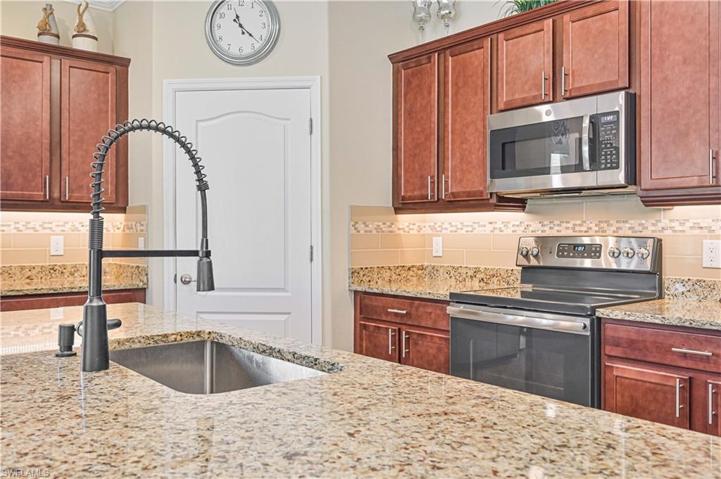 Upgraded Kitchen Sink/ Faucet - Tile Backsplash