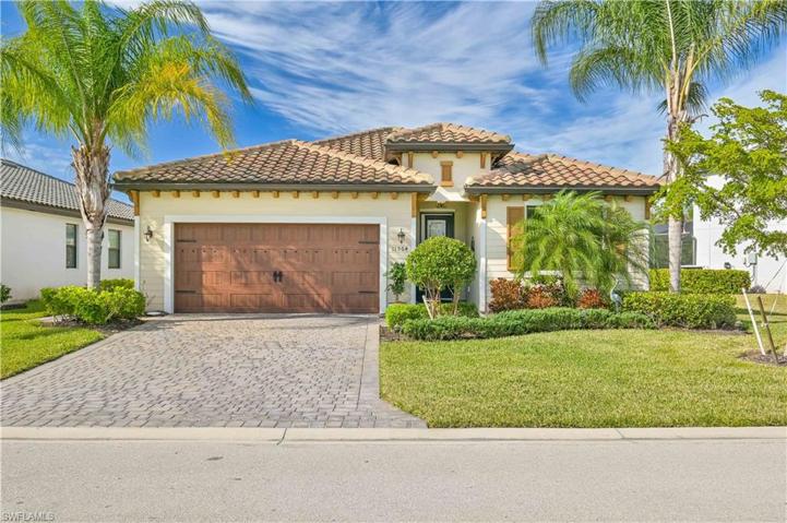 Luxurious 3 Bedrooms with a Den 3 Full Bathrooms - Upgraded Garage Door - Lush Landscaping - Screen Slider Front Door