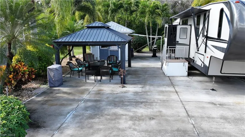 View of patio / terrace with a gazebo and outdoor lounge area