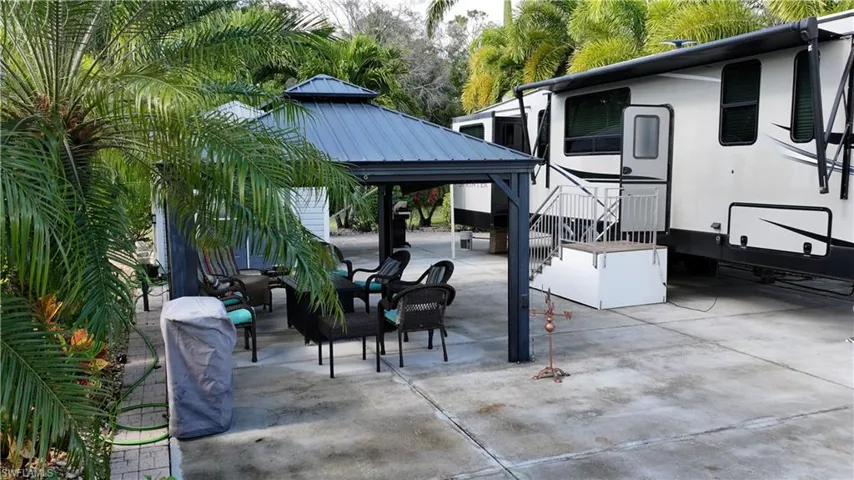 View of patio featuring a gazebo