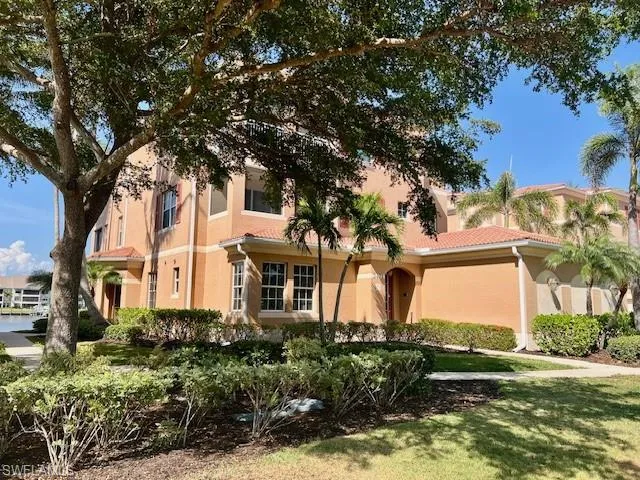 Mediterranean / spanish-style home featuring stucco siding and a tile roof