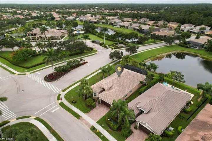 Aerial view of residential area with a large body of water