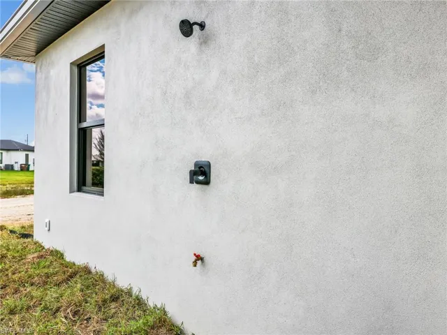 View of home's exterior featuring stucco siding