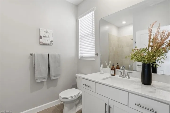 Bedroom 2 ensuite with walk in shower and glass shower door