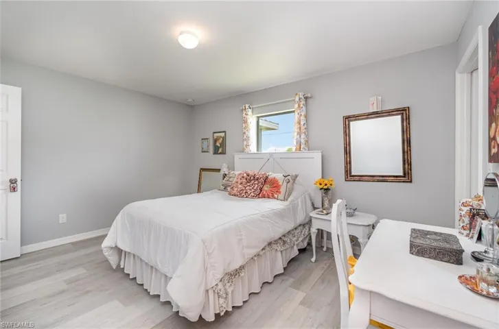Main bedroom featurning luxury vinyl plank flooring