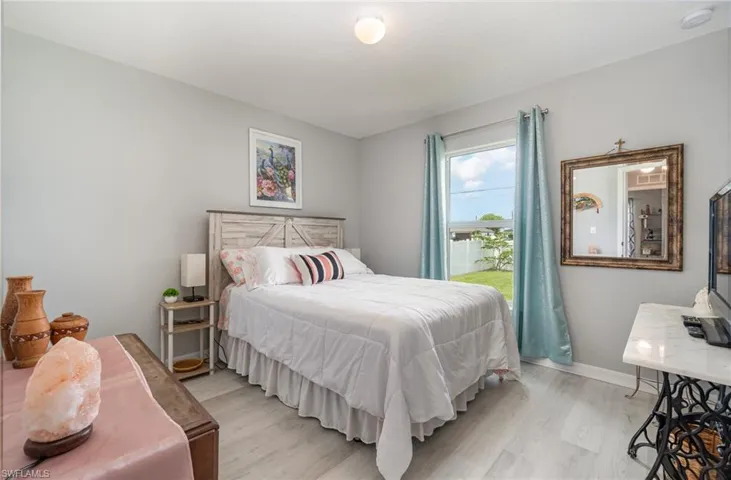 Bedroom 2 featuring luxury vinyl plank flooring