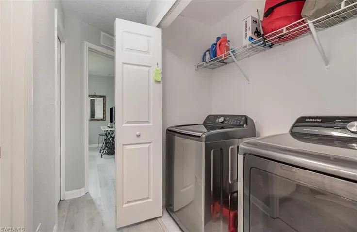Laudry closet with Samsung washer and dryer
