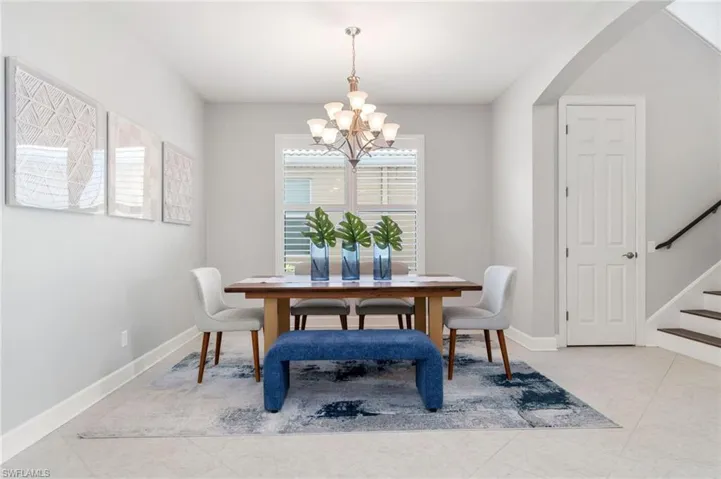 Dining area with accent light, and tile patterned floors