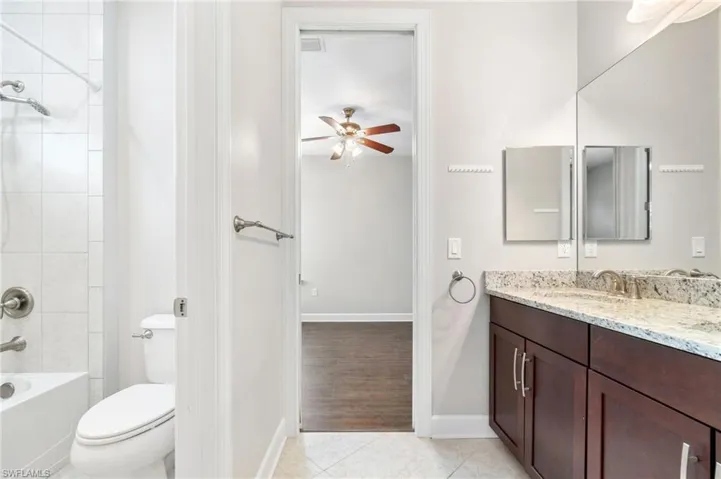 Full bathroom featuring dual sink