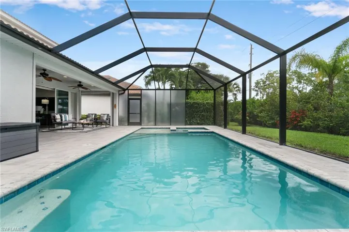 View of swimming pool with a patio area