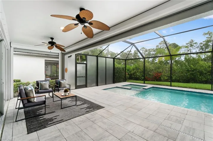 Newer pool with saltwater system with ample shaded area for sitting, dining, and a future summer kitchen area.  The back screened lanai features a NEW pool + spa and sundeck