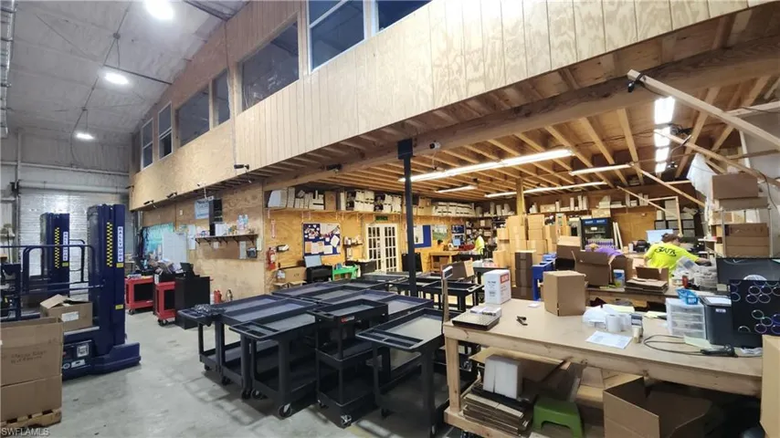 Garage featuring a workshop area