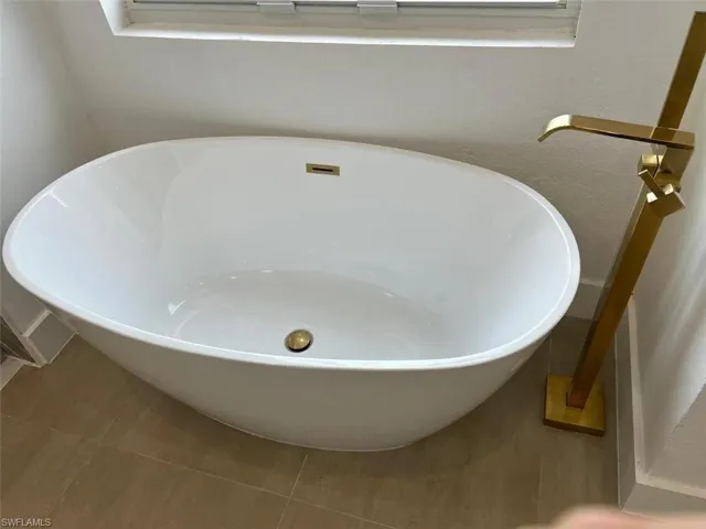 Bathroom featuring tile patterned floors