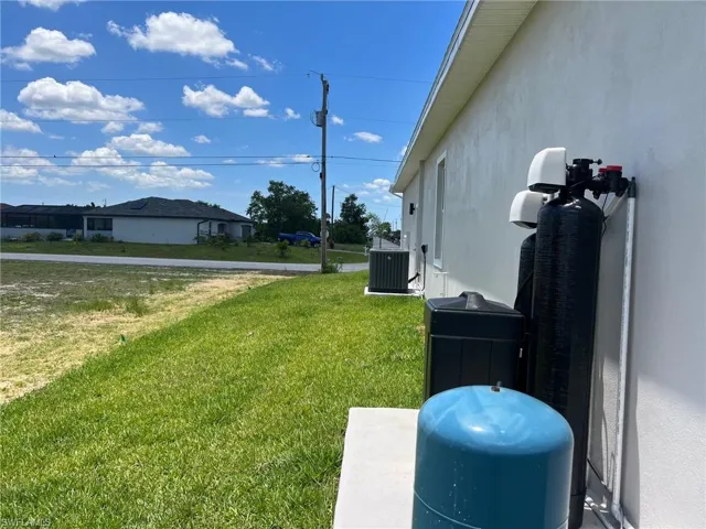 View of yard featuring central air condition unit