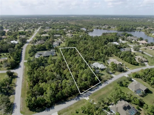 Wooded residential lot with street frontage
