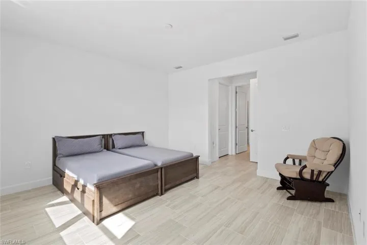 Bedroom with baseboards
