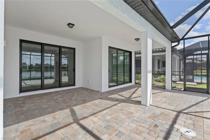 View of patio / terrace with a lanai and a sunroom