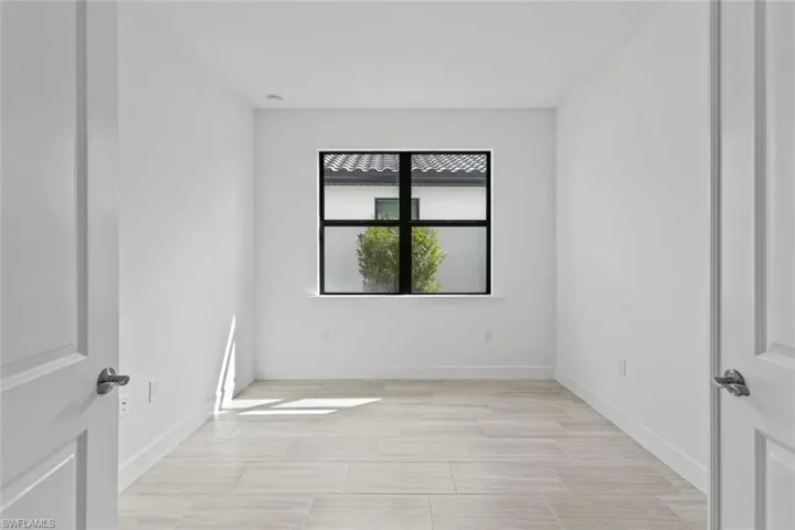 Den/flex room perfect for a home office, gym, or an extra bedroom