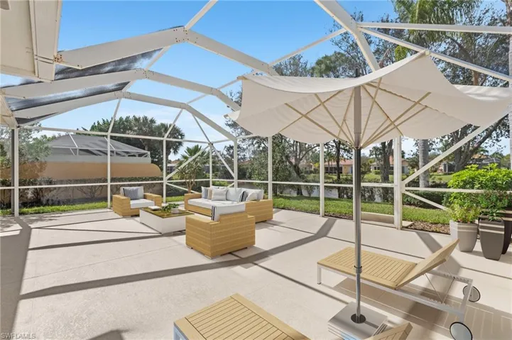 View of patio / terrace featuring an outdoor living space and a lanai