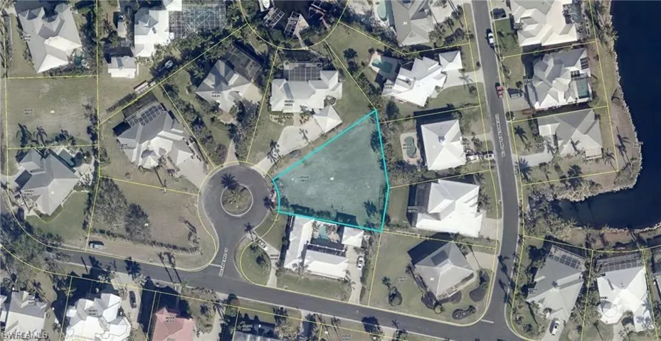 Aerial map of property and surrounding area featuring property parcel outlined
