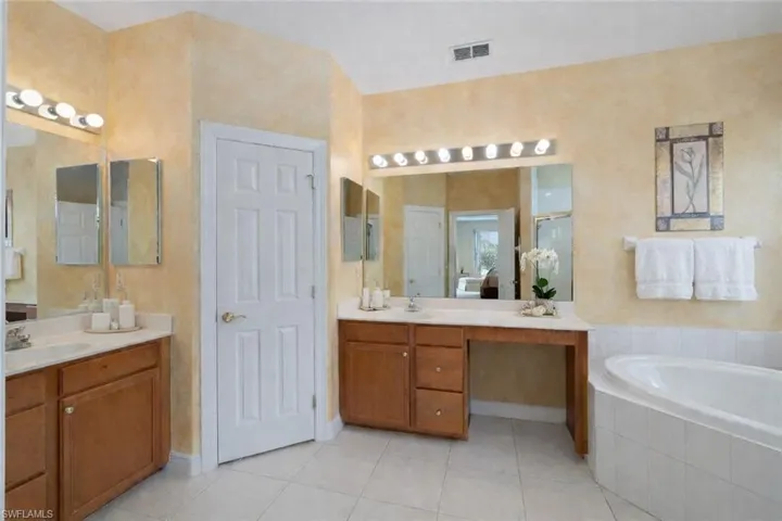 Primary bath with walk in linen closet
