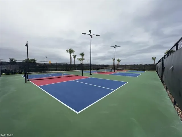 View of Pickleball court with fence