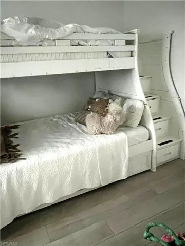Bedroom with wood finished floors