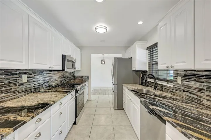 124  Flame Vine  DR, Naples, FL 34110
