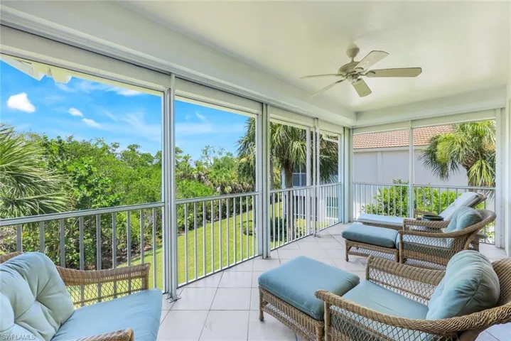 Spacious balcony with new screens and electric storm shutters.
