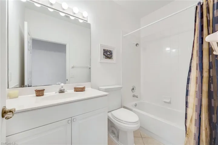 Guest bathroom with shower/tub combination.