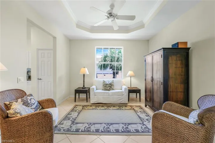 Formal dining room, off the kitchen - currently being utilized as a den.
