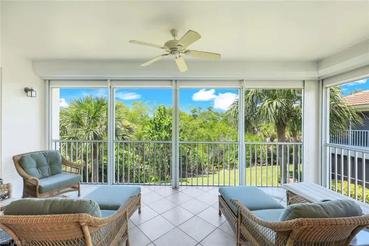Screened balcony with peaceful views of the surrounding preserve.
