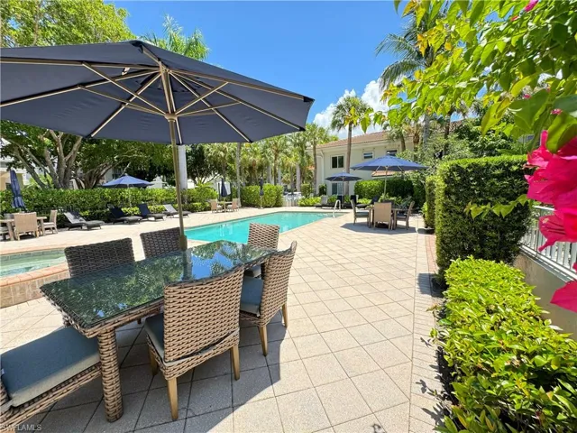 View of patio / terrace with a fenced in pool