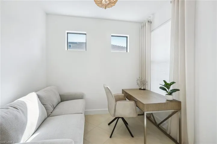 Home office featuring light tile patterned floors