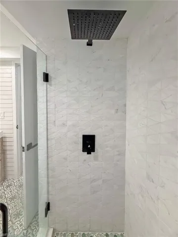 Bathroom with an enclosed shower