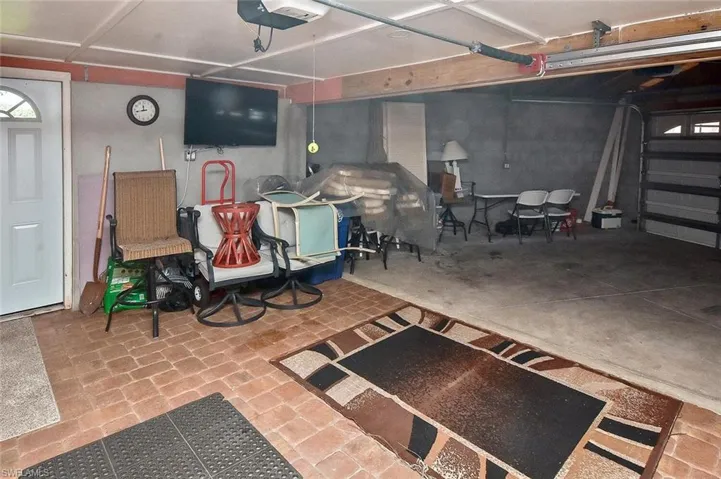 The original single-car garage with pavered floor can have multiple uses