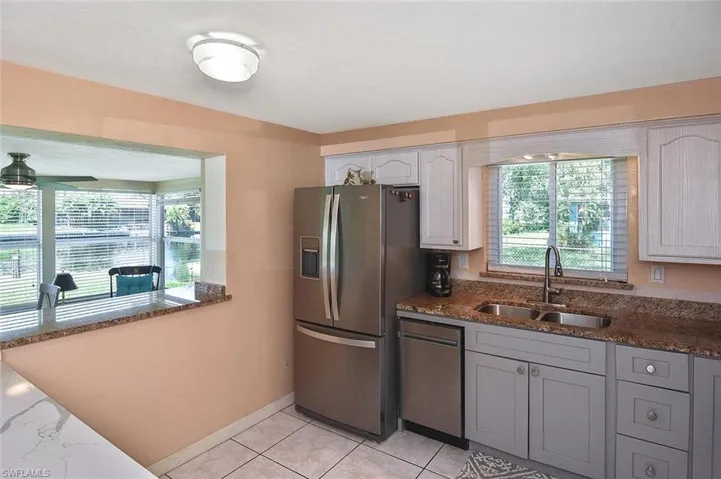 Kitchen has southern and western window views...