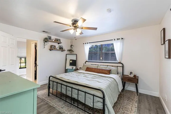 Bedroom featuring a ceiling fan and wood finished floors